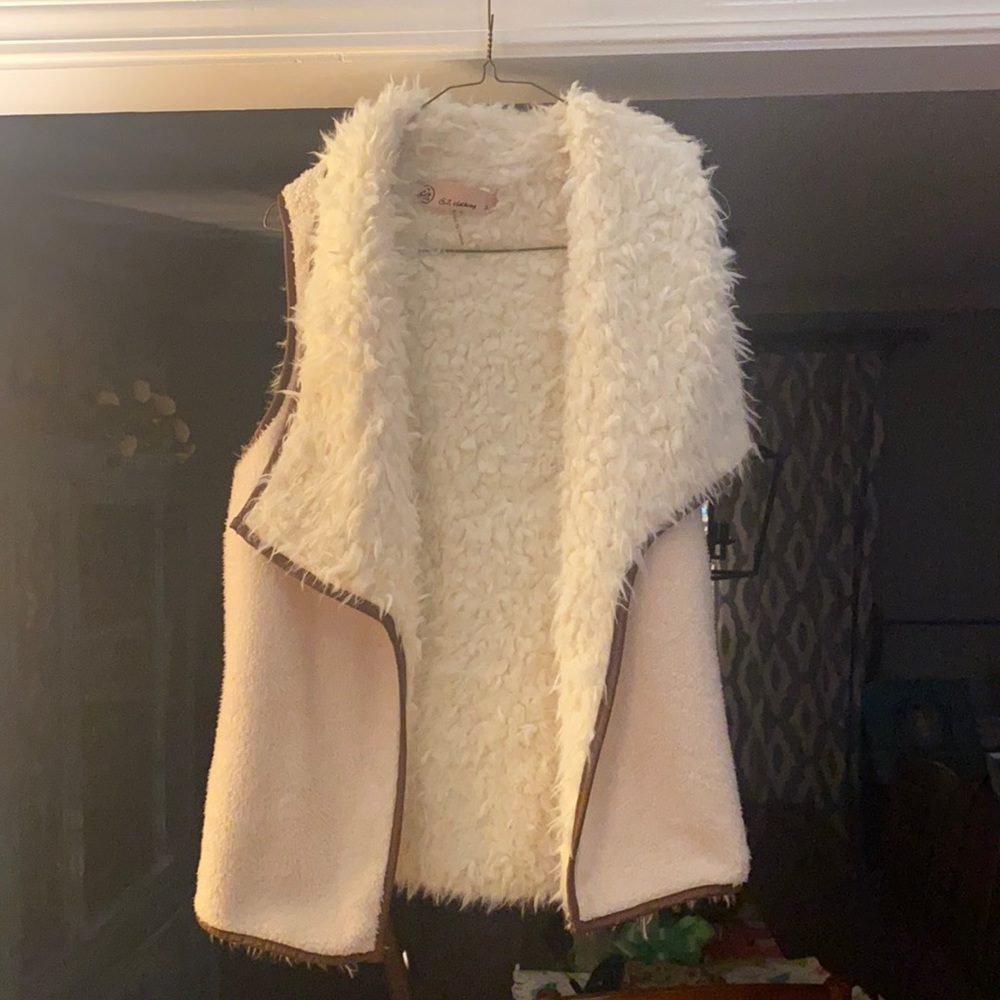 Reversible off white fur vest, used but great condition